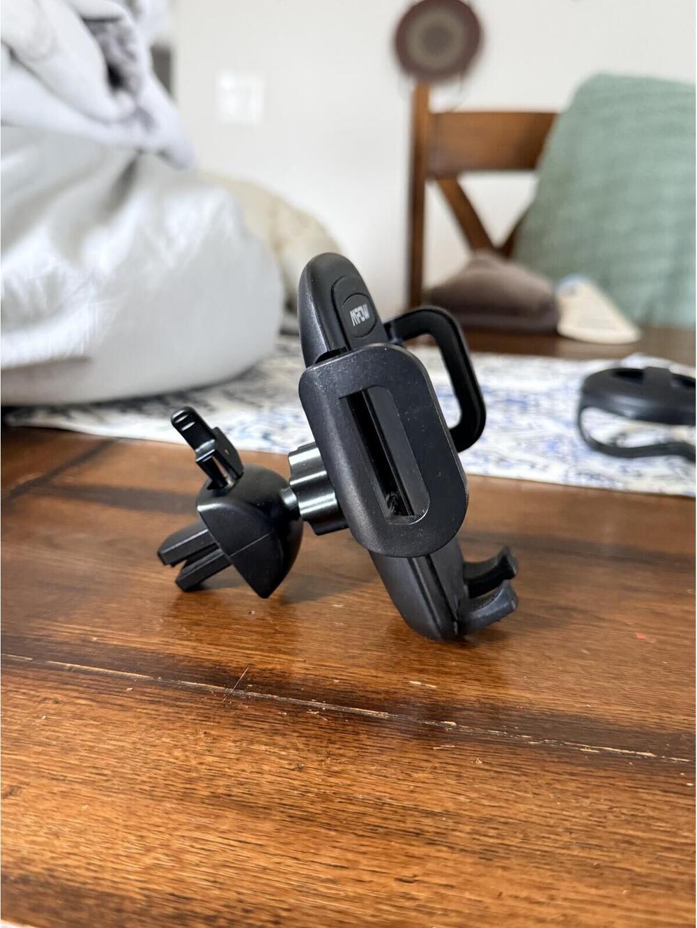 Adjustable cell phone car vent holder